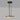 Anvers pendant in bronze with a honed alabaster disc, studio view