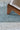 Figueras jute rug in Aqua, close-up detail
