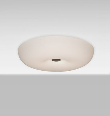 Nimbus 16 opal glass flush mount, glowing | Besa Lighting
