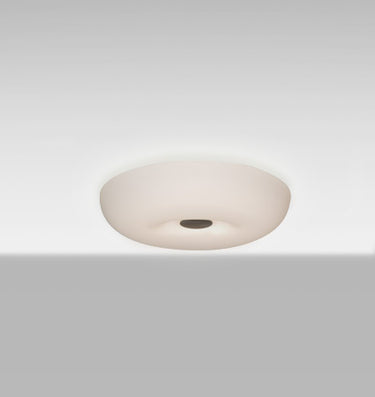 Nimbus 10 opal glass flush mount, glowing | Besa Lighting