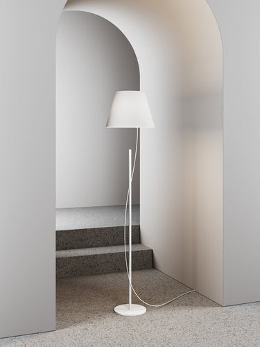 Modern reading corner illuminated by the Lodes Hover floor lamp