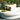Demi-Stack half-round drum on a Moon Pad as tiered terrace seating with a tray of fruit
