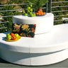 Demi-Stack half-round drum on a Moon Pad as tiered terrace seating with a tray of fruit