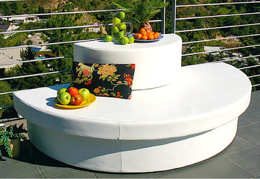 Demi-Stack half-round drum on a Moon Pad as tiered terrace seating with a tray of fruit