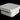 Chill White Stand square ottoman with rounded corners on a black studio background