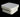 Chill White Stand square ottoman with rounded corners on a black studio background