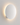 Contemporary matte white Lodes Puzzle Round Single LED light mounted on a white wall