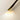 Luxury brown leather Cobra bedside lamp with touch dimmer switch and gold anodised inner reflector.