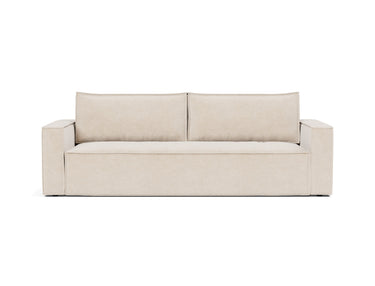 Newilla sleeper upholstered in Adario Basmati, studio shot