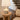 Oliver Ivory Cordless Table Lamp Brushed Nickel illuminating a living room