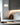 Totem Mini pendant in white by Pablo over a grey kitchen island
