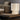 Totem Table lamp by Pablo beside a corner sofa