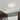 Pica 11 sand glass ceiling light in a hallway | Besa Lighting
