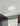 Pica 14 sand glass ceiling light in a hallway | Besa Lighting