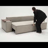 How-to video thumbnail showing Newilla wide arm sleeper sofa with storage by Innovation Living demonstrating easy sofa-to-bed conversion steps.