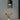 Barro Oaxacan clay pendant light with warm glow, editorial photograph