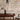 Barro handmade clay and glass pendant glowing in a styled room