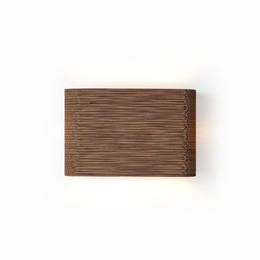 Skew 15 wall sconce in the Natural finish, studio view, Graypants Scraplights