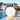 Smart & Green Globe XL sphere lamp glowing beside a resort pool at dusk