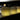 Smart & Green So Fresh lamps glowing yellow along a bar counter at night