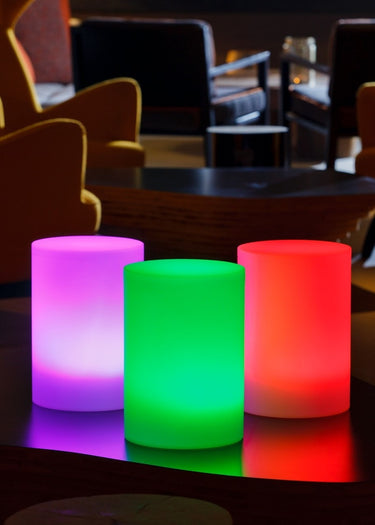 Smart & Green Tower XXS cylinder lamps glowing pink, green and red
