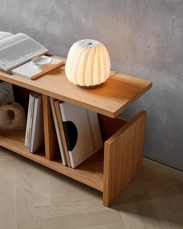 White Coated Paper, lit on a bookshelf | ST906 Mini Table Lamp by Tom Rossau