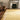 Syracuse wool rug in Yellow, styled in a room