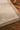 Syracuse wool rug in Natural, close-up detail
