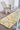 Ambre wool rug, styled in a room