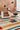 Hacienda multicolor wool rug styled in a living room