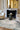 Mirage viscose rug, styled in a room