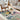 Tête à Tête wool rug, styled in a room
