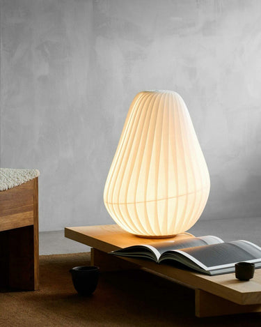 Lit on a side table | TR31 Table Lamp by Tom Rossau