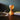 Lit on a desk with books | TR7 Table Lamp by Tom Rossau