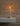 Graypants Wick S PRO lifestyle, lamp by a hearth