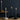 Graypants Wick Classic lifestyle, group of lamps on a blue surface
