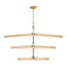 Kelly Wearstler Linea 56-inch tiered chandelier with glowing alabaster shades in a modern dining room.