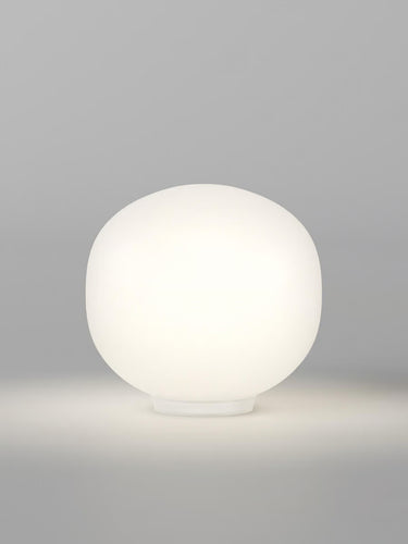 Lodes Volum sculptural glass table lamp by Snøhetta with glossy white diffuser