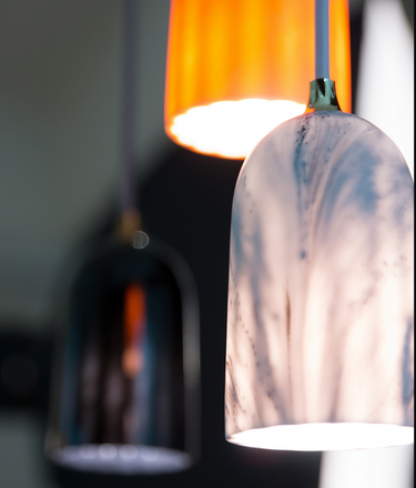 James Bartlett designed Doric 8 pendant with rose marble-look shade for modern spaces.