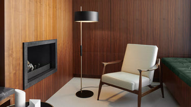 1953 Floor Lamp by Oluce with satin gold stem and black matte metal shade for modern living rooms
