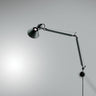 Artemide Tolomeo Classic LED Wall Light mounted on a modern living room wall