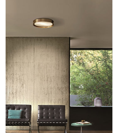 Brass Berlin 720 ceiling lamp by Oluce for living room lighting