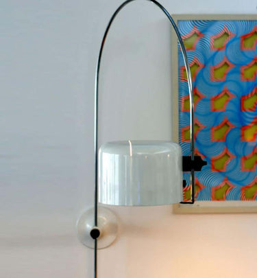 Coupé 1158 adjustable wall lamp by Oluce in black with pivoting aluminum dome shade