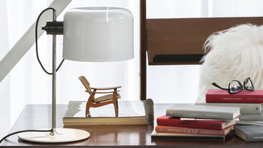 Joe Colombo designer table lamp in white lacquered metal with adjustable direct light