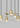 Eaves 18 light linear pendant, natural brass, close-up of domed LED optic, modern linear lighting detail.