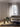 Lodes Flar Large modern floor lamp, a Patrick Norguet design, standing in a living room.