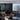 Sleek horizontal LED suspension lamp by Oluce Ilo 487 for hotel reception or lobby