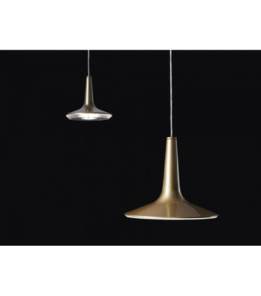 Oluce Kin 478 satin gold suspension lamp illuminating dining rooms and lounges