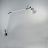 Modern wall-mounted Tolomeo lamp with S-bracket and 360-degree tilt diffuser for reading or workspace lighting