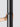 Black ombre Croma floor lamp providing soft, indirect lighting in a contemporary office.